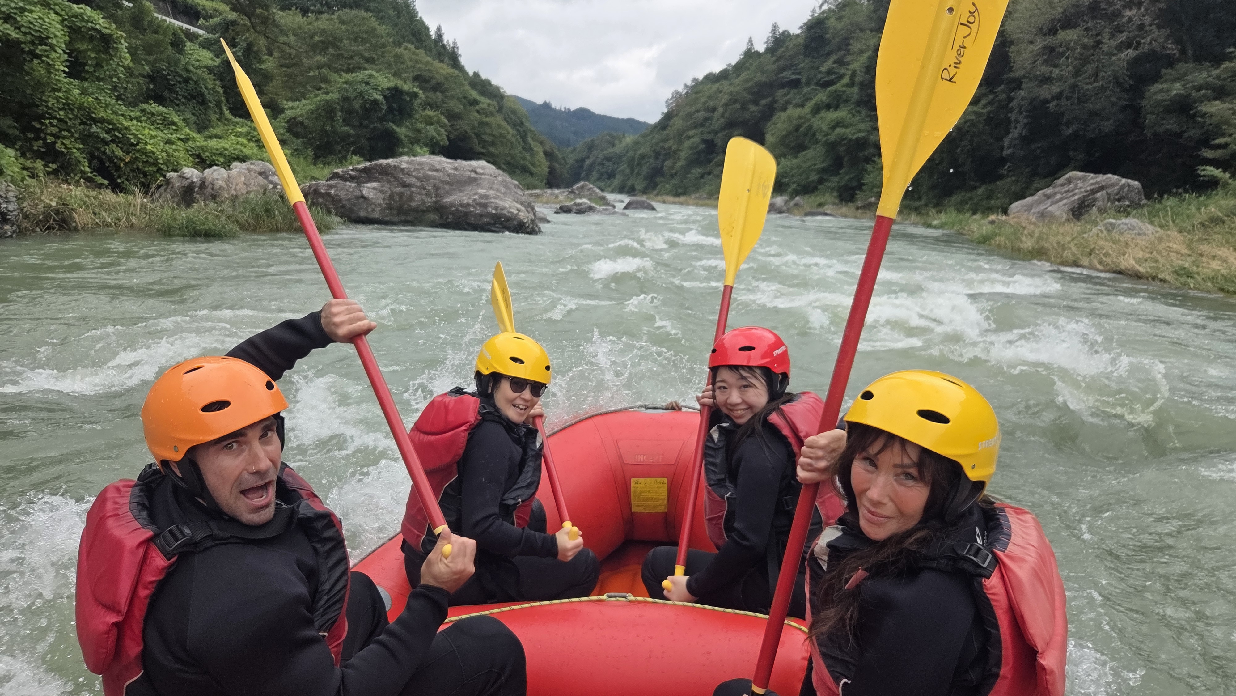 International guests enjoying rafting near Tokyo on the Tama River with Feel Outdoor guides